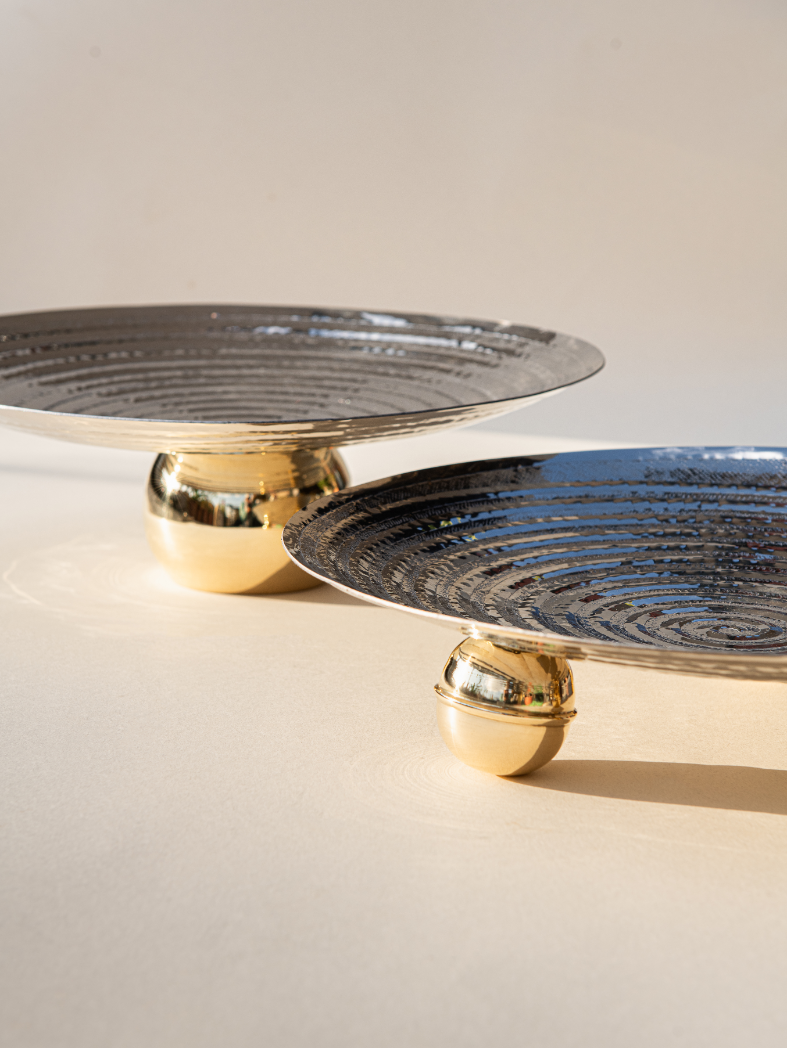 Stainless handmade Ra collection circular plate with copper ball holder